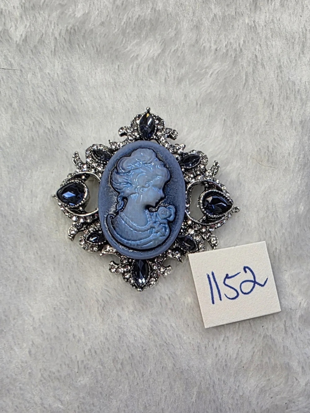 Vintage-Inspired Blue Cameo Brooch with Dark Blue Accents